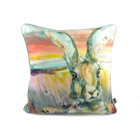 Luxury filled duck feather cushion with cotton velvet cover in Caroline Hall hare design and piped edging.