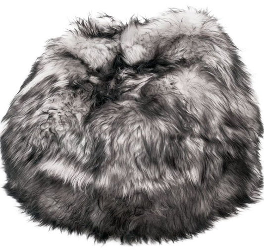 Long haired ivory Icelandic sheepskin bean bag with silver and black tips.