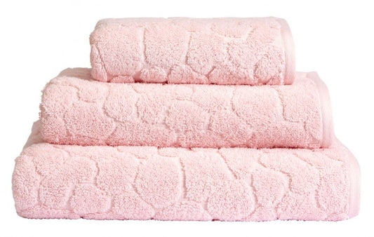 Pink 750gsm Turkish combed cotton hand towel with a raised patterned design.