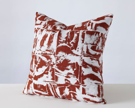 Hand printed terracotta duck feather cushion using heavy-weight linen and contrasting zip, inspired by woodblock printing.