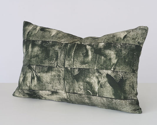 Hand printed racing green duck feather cushion using heavy-weight linen and contrasting zip, inspired by woodblock printing.