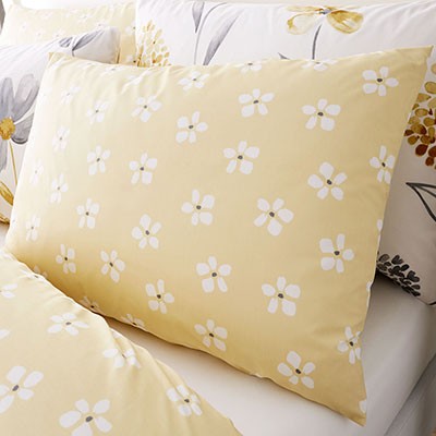 Yellow floral boudoir cushion.
